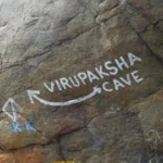 virupaksha-cave-arrow-sign-holy-footage-125494211_iconl