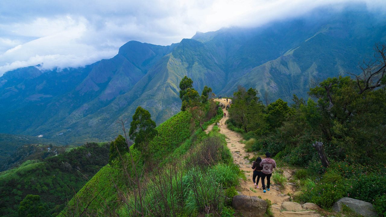 A panoramic view of the misty hills and valleys from Top Station